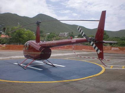 Rear Left Side View - Robinson R44 with PJ-LIH registration (red)